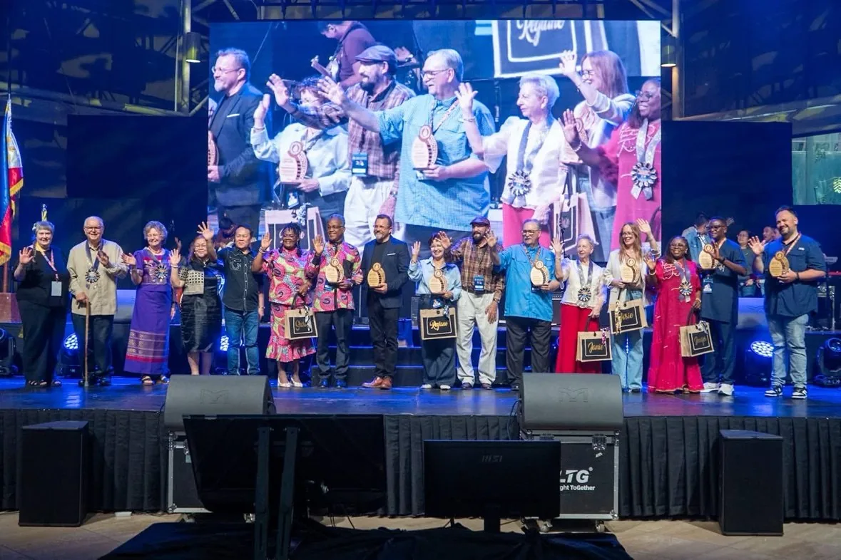 Missionaries being honored on stage at Global Conference 2026