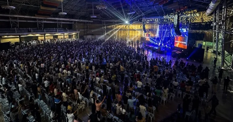 Packed arena crowd at PCG Global Conference 2026
